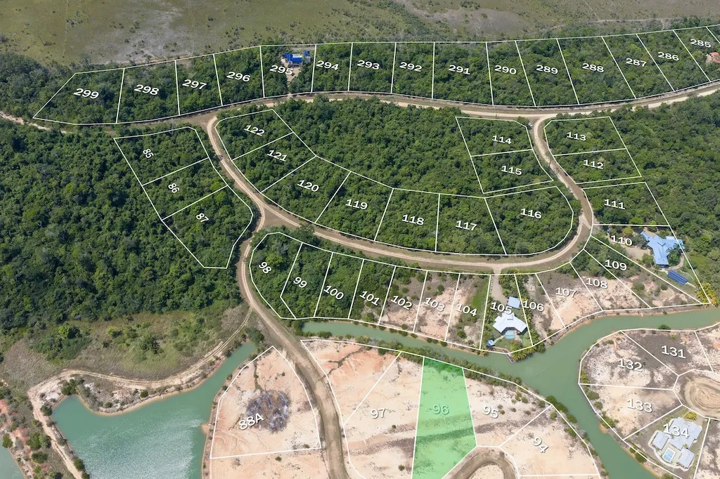 Aerial plan view of numbered land parcels with highlighted lot 96 beside water