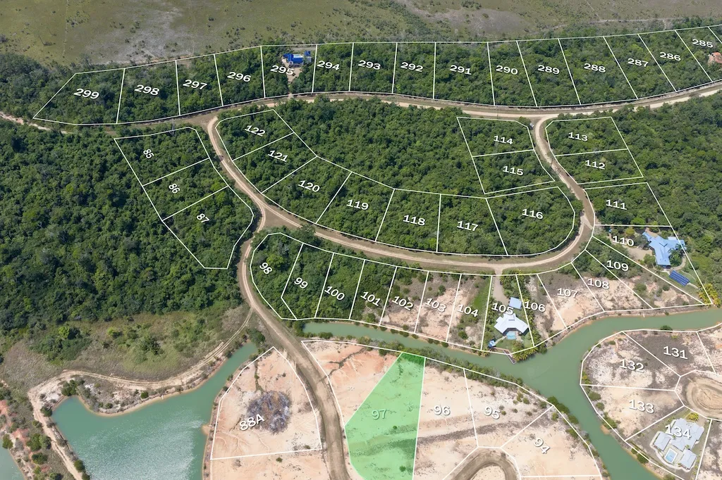 Aerial plan overlay with numbered lots, highlighted lot 97 beside water